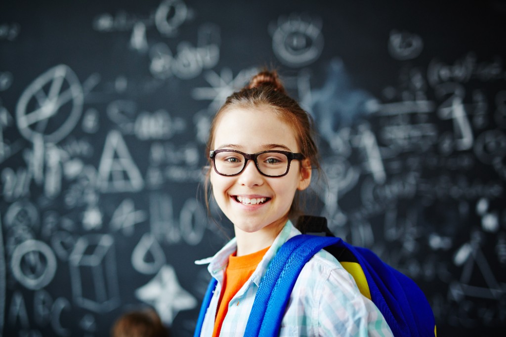 Student smiling in classroom — NovaEd supports whole-child educational fit